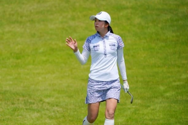 Kotone Hori of Japan acknowledges fans on the 4th green during the second round of Rakuten Super Ladies at Tokyu Grand Oak Golf Club on July 30, 2021...