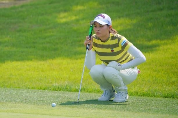 Hina Arakaki of Japan lines up a putt on the 6th green during the second round of Rakuten Super Ladies at Tokyu Grand Oak Golf Club on July 30, 2021...