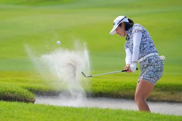 Rie Tsuji of Japan hits out from a bunker on the 7th hole during the second round of Rakuten Super Ladies at Tokyu Grand Oak Golf Club on July 30,...