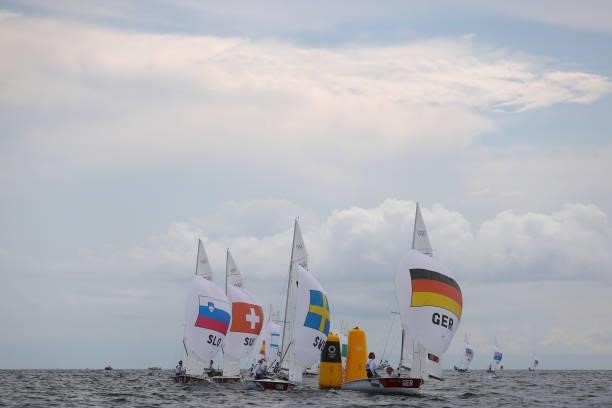 Women's 470 class rounds a mark on day seven of the Tokyo 2020 Olympic Games at Enoshima Yacht Harbour on July 30, 2021 in Fujisawa, Kanagawa, Japan.