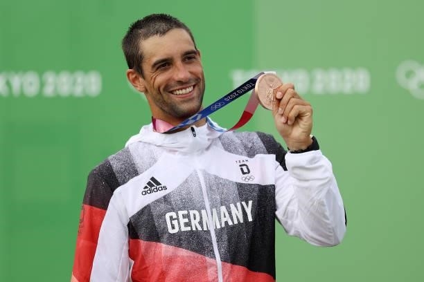 Bronze medalist Hannes Aigner of Team Germany poses with his medal following the Men's Kayak Slalom Final on day seven of the Tokyo 2020 Olympic...