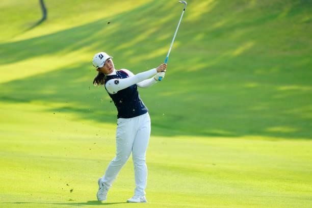 Yuri Yoshida of Japan hits her third shot on the 18th hole during the second round of Rakuten Super Ladies at Tokyu Grand Oak Golf Club on July 30,...