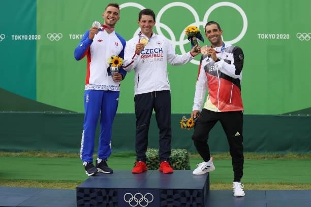 Silver medalist Jakub Grigar of Team Slovakia, Gold medalist Jiri Prskavec of Team Czech Republic, and Bronze medalist Hannes Aigner of Team Germany...