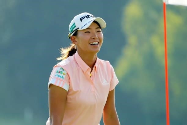 Hinako Shibuno of Japan smiles after holing out on the 18th green during the second round of Rakuten Super Ladies at Tokyu Grand Oak Golf Club on...