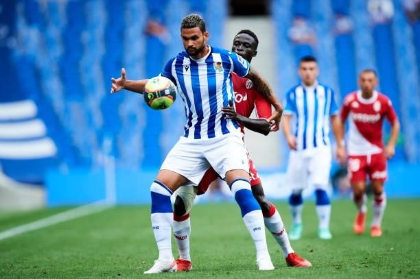Willian Jose Da Silva of Real Sociedad duels for the ball with Krepin Diatta of AS Monaco during the Friendly Match between Real Sociedad and As...