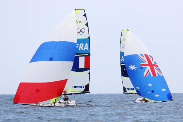 Lucas Rual and Emile Amoros of Team France and Will Phillips and Sam Phillips of Team Australia compete in the Men's Skiff 49er class on day seven of...