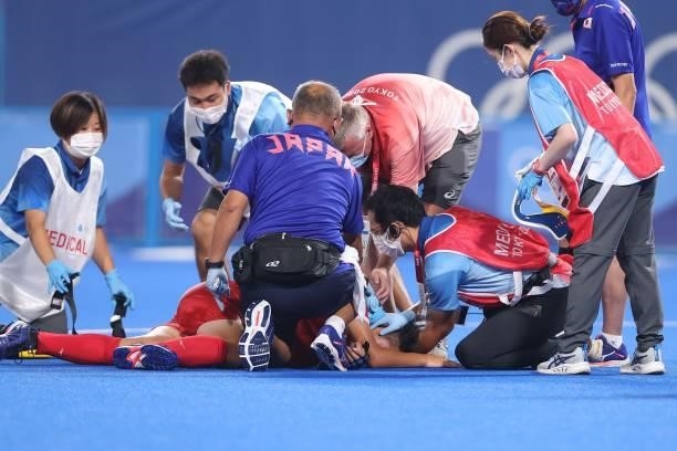 Shota Yamada of Team Japan gets injured during the Men's Preliminary Pool A match between Japan and India on day seven of the Tokyo 2020 Olympic...