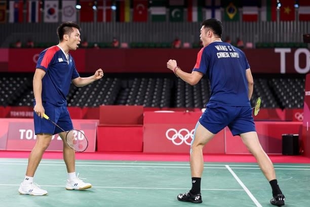 Lee Yang and Wang Chi-lin of Team Chinese Taipei react as they competes against Mohammad Ahsan and Hendra Setiawan of Team Indonesia during a Men’s...