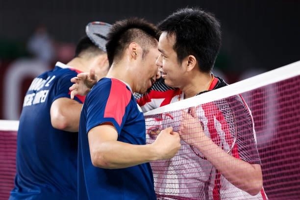 Lee Yang and Wang Chi-lin of Team Chinese Taipei greet their opponents Mohammad Ahsan and Hendra Setiawan of Team Indonesia after a Men’s Doubles...