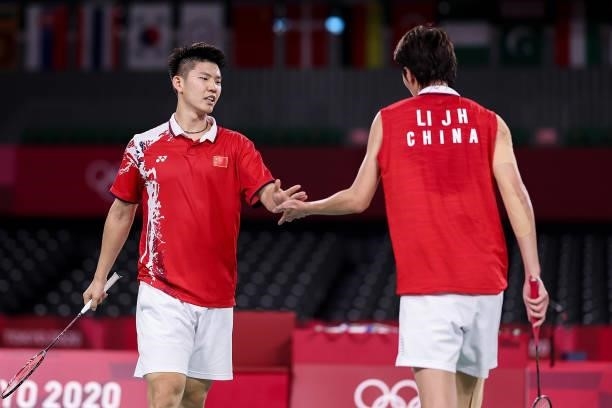 Li Jun Hui and Liu Yu Chen of Team China react as they compete against Aaron Chia and Soh Wooi Yik of Team Malaysia during a Men’s Doubles Semi-final...