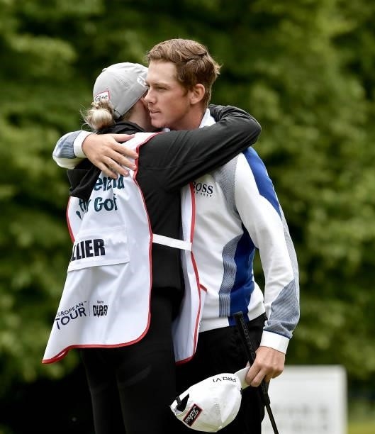 Daniel Hillier of New Zealand embraces his caddie after his round during Day Two of The ISPS HANDA World Invitational at Galgorm Spa & Golf Resort on...