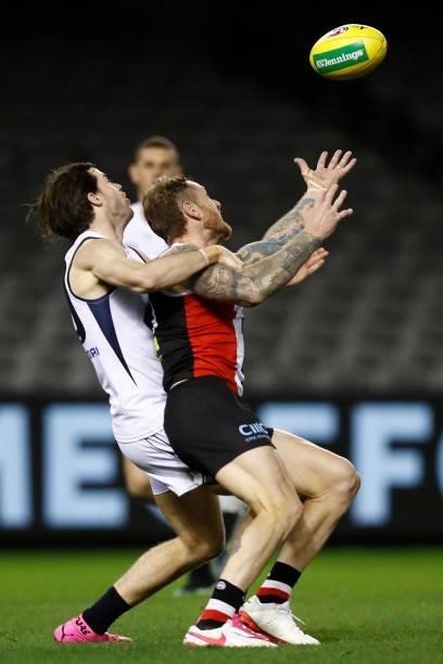 Lachie Plowman of the Blues and Tim Membrey of the Saints compete during the round 20 AFL match between St Kilda Saints and Carlton Blues at Marvel...