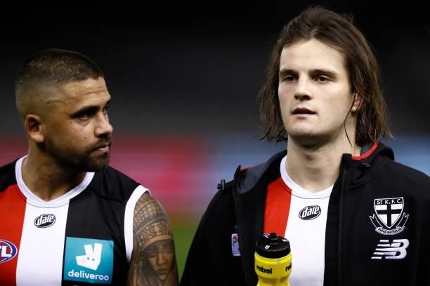 Bradley Hill of the Saints looks a dejected team mate Hunter Clark after the round 20 AFL match between St Kilda Saints and Carlton Blues at Marvel...