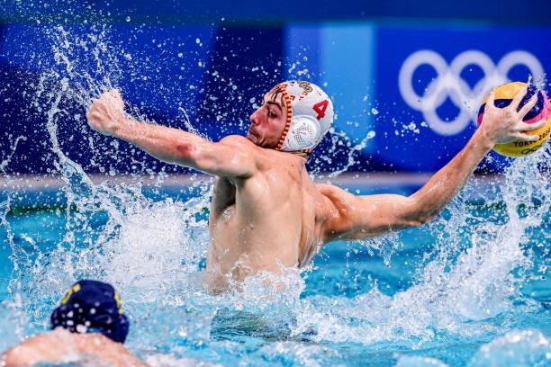Srdan Vuksanovic of Kazakhstan, Alejandro Bustos of Spain during the Tokyo 2020 Olympic Waterpolo Tournament Men match between Team Spain and Team...