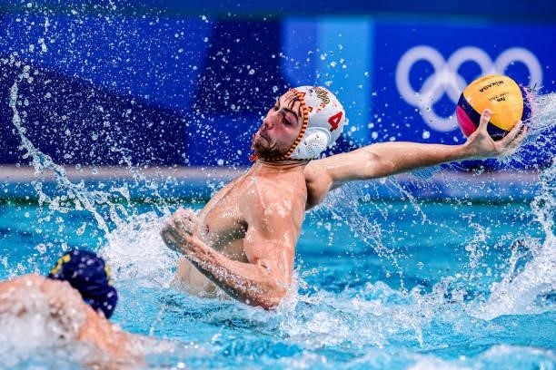 Srdan Vuksanovic of Kazakhstan, Alejandro Bustos of Spain during the Tokyo 2020 Olympic Waterpolo Tournament Men match between Team Spain and Team...