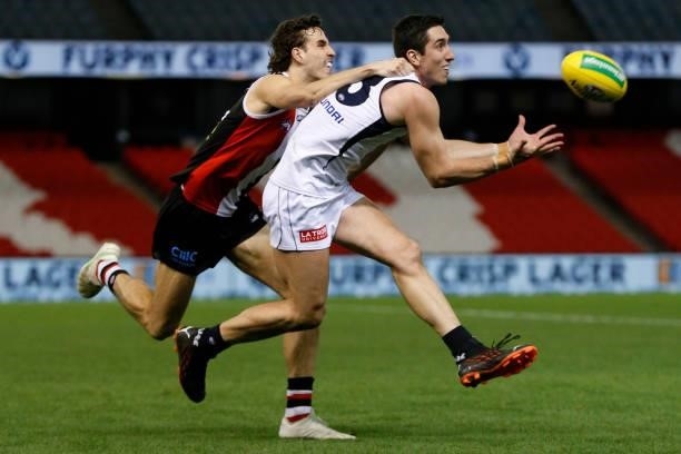 Jacob Weitering of the Blues marks the ball in front of Max King of the Saints during the round 20 AFL match between St Kilda Saints and Carlton...