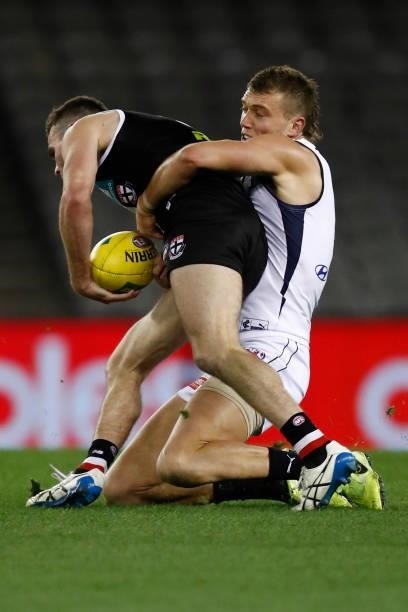 Patrick Cripps of the Blues tackles Brad Crouch of the Saints during the round 20 AFL match between St Kilda Saints and Carlton Blues at Marvel...