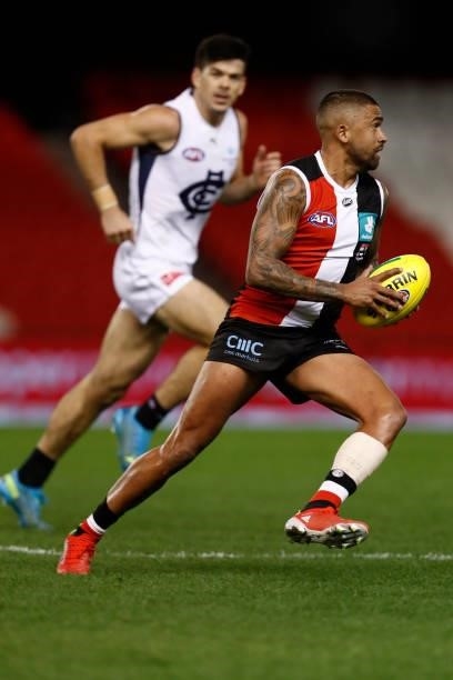 Bradley Hill of the Saints runs with the ball during the round 20 AFL match between St Kilda Saints and Carlton Blues at Marvel Stadium on July 30,...
