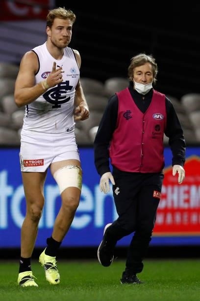 Harry McKay of the Blues gives the thumbs up to the interchange bench after a heavy collision during the round 20 AFL match between St Kilda Saints...