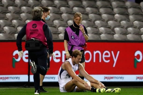 Harry McKay of the Blues catches his breath after a heavy collision during the round 20 AFL match between St Kilda Saints and Carlton Blues at Marvel...