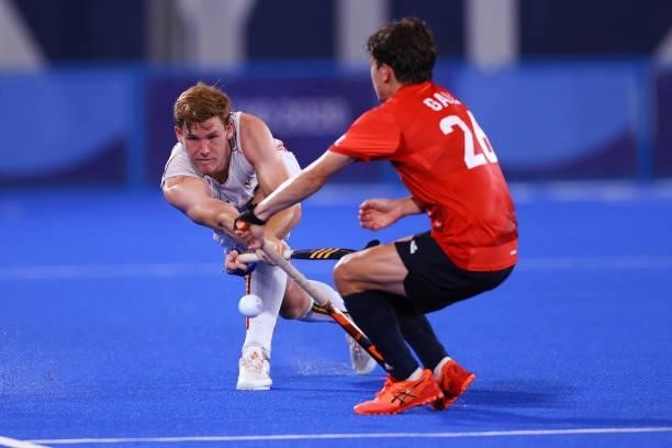 Tom Alain Boon of Team Belgium and James Richard Gall of Team Great Britain battle for the ball during the Men's Preliminary Pool B match between...
