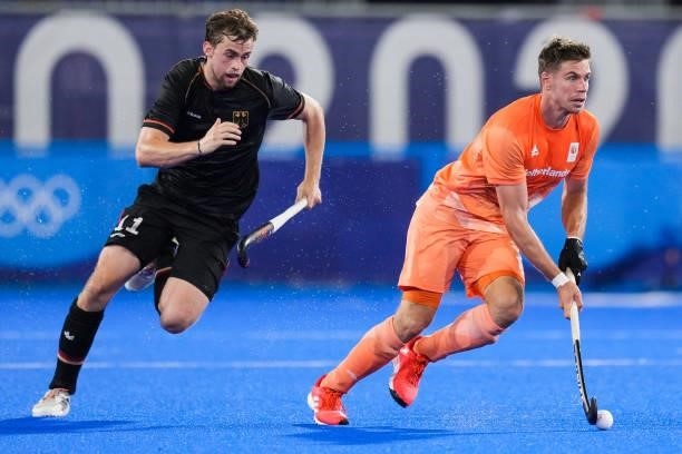 Sander de Wijn of the Netherlands and Constantin Staib of Germany competing on Men's Pool B during the Tokyo 2020 Olympic Games at the Oi Hockey...