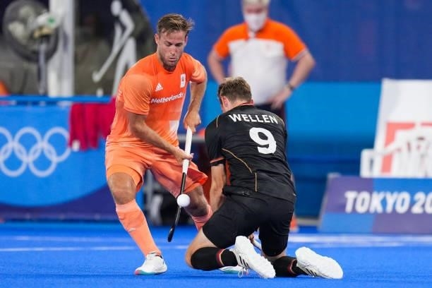 Jeroen Hertzberger of the Netherlands and Niklas Wellen of Germany competing on Men's Pool B during the Tokyo 2020 Olympic Games at the Oi Hockey...