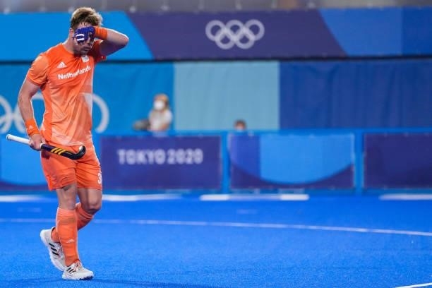 Mink van der Weerden of the Netherlands disappointed while competing on Men's Pool B during the Tokyo 2020 Olympic Games at the Oi Hockey Stadium on...