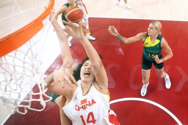 Yueru Li of Team China goes up for a rebound against Australia during the second half of a Women's Basketball Preliminary Round Group C game on day...