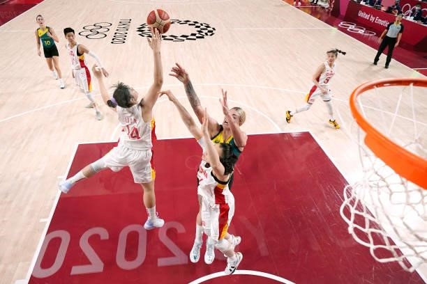Yueru Li of Team China and Cayla George of Team Australia jump for the ball during the second half of a Women's Basketball Preliminary Round Group C...