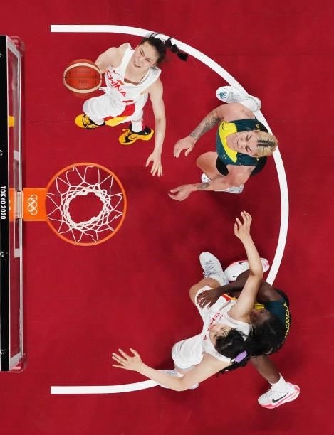 Siyu Wang of Team China drives to the basket against Cayla George of Team Australia as Yueru Li boxes out Ezi Magbegor during the second half of a...