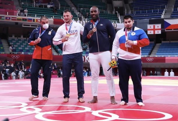 Silver medalist Guram Tushishvili of Team Georgia, gold medalist Lukas Krpalek of Team Czech Republic, bronze medalist B Tamerlan Bashev of Team ROC...