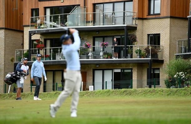 Paul Dunne of Ireland watched by a golf fan during Day Two of The ISPS HANDA World Invitational at Galgorm Spa & Golf Resort on July 30, 2021 in...