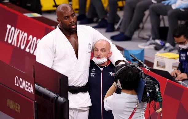 Teddy Riner with his coach Franck Chambily after winning the Bronze Medal match of the +100kg category during day seven at the judo events of the...
