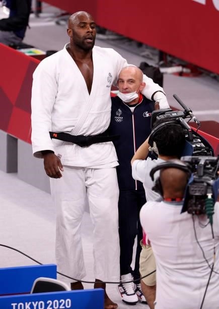 Teddy Riner with his coach Franck Chambily after winning the Bronze Medal match of the +100kg category during day seven at the judo events of the...