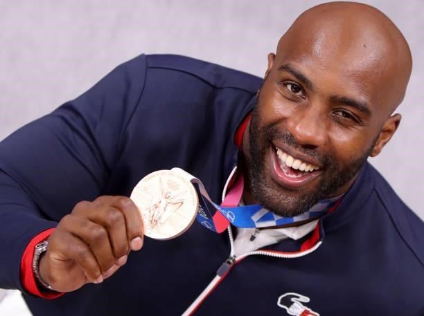 Teddy Riner poses with his Bronze Medal of the +100kg category during day seven at the judo events of the Tokyo 2020 Olympic Games at Nippon Budokan...