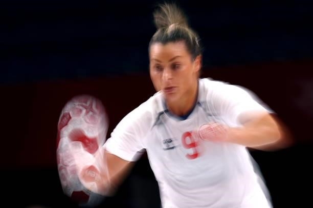 Nora Moerk of Team Norway runs at a goal during the Women's Preliminary Round Group A handball match between Montenegro and Norway on day six of the...