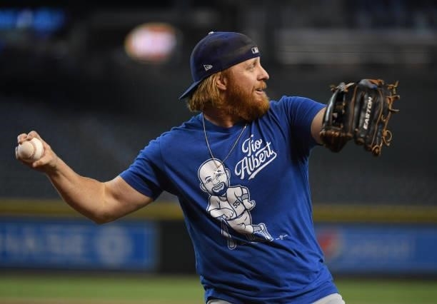 Justin Turner of the Los Angeles Dodgers prepares for a game against the Arizona Diamondbacks at Chase Field on July 30, 2021 in Phoenix, Arizona.