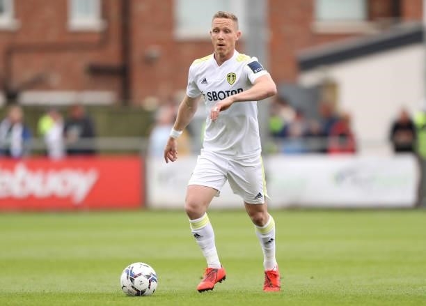 Adam Forshaw of Leeds United runs with the ball during the Pre-Season Friendly match between Fleetwood Town and Leeds United at Highbury Stadium on...
