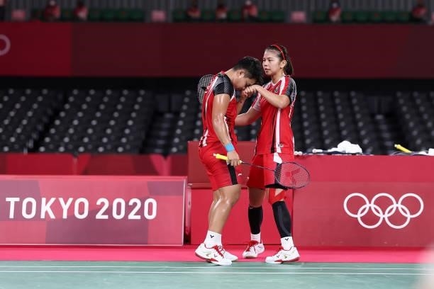 Greysia Polii and Apriyani Rahayu of Team Indonesia react as they compete against Lee Sohee and Shin Seungchan of Team South Korea during a Women’s...