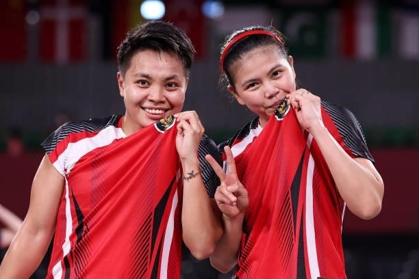 Greysia Polii and Apriyani Rahayu of Team Indonesia pose for camera after their victory against Lee Sohee and Shin Seungchan of Team South Korea...