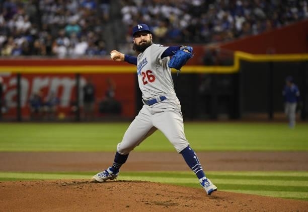 Tony Gonsolin of the Los Angeles Dodgers delivers a first inning pitch against the Arizona Diamondbacks at Chase Field on July 30, 2021 in Phoenix,...