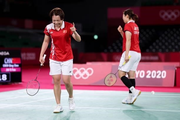 Chen Qing Chen and Jia Yi Fan of Team China react as they compete against Kim Soyeong and Kong Heeyong of Team South Korea during a Women’s Doubles...