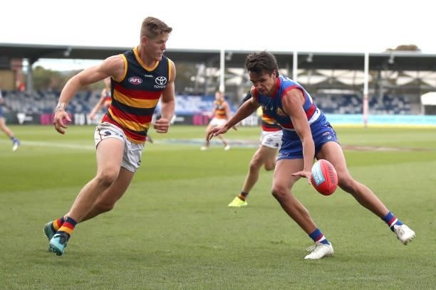 Jamarra Ugle-Hagan of the Bulldogs reaches for the ball during the round 19 AFL match between Western Bulldogs and Adelaide Crows at Mars Stadium on...
