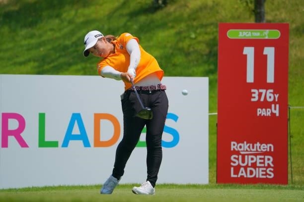 Mao Saigo of Japan hits her tee shot on the 11th hole during the final round of Rakuten Super Ladies at Tokyu Grand Oak Golf Club on July 31, 2021 in...