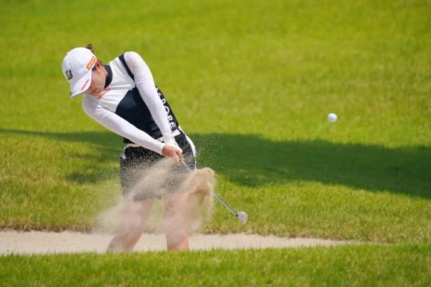 Sayaka Takahashi of Japan hits her second shot from a bunker on the 11th hole during the final round of Rakuten Super Ladies at Tokyu Grand Oak Golf...