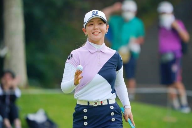Yuri Yoshida of Japan acknowledges fans after the birdie on the 14th green during the final round of Rakuten Super Ladies at Tokyu Grand Oak Golf...