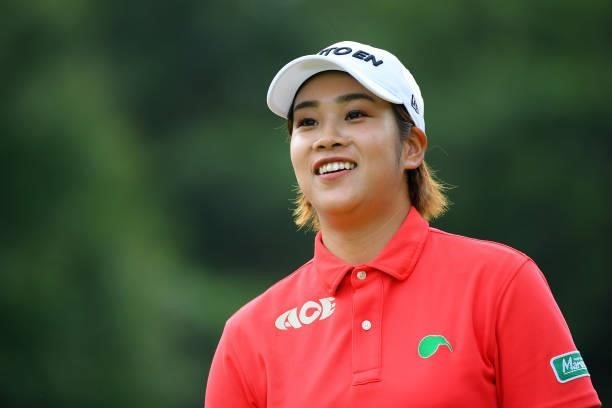 Mayu Hamada of Japan smiles after her tee shot on the 17th hole during the final round of Rakuten Super Ladies at Tokyu Grand Oak Golf Club on July...