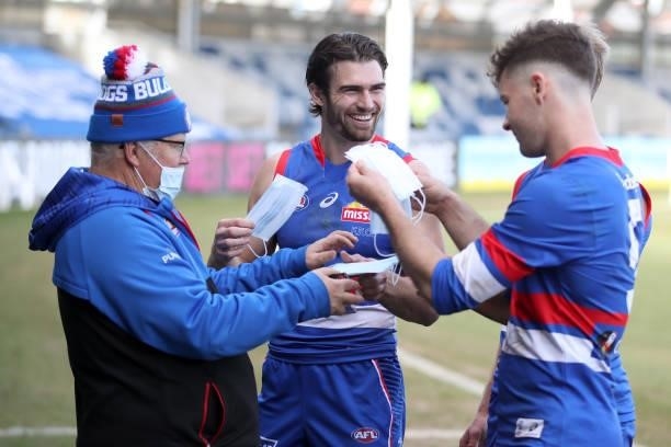 Easton Wood of the Bulldogs collects a face mask following the round 19 AFL match between Western Bulldogs and Adelaide Crows at Mars Stadium on July...