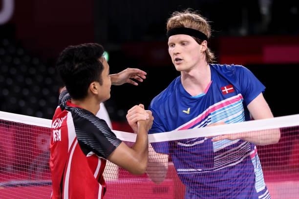 Anthony Sinisuka Ginting of Team Indonesia greets his opponent Anders Antonsen of Team Denmark after a Men's Singles Quarterfinal match on day eight...